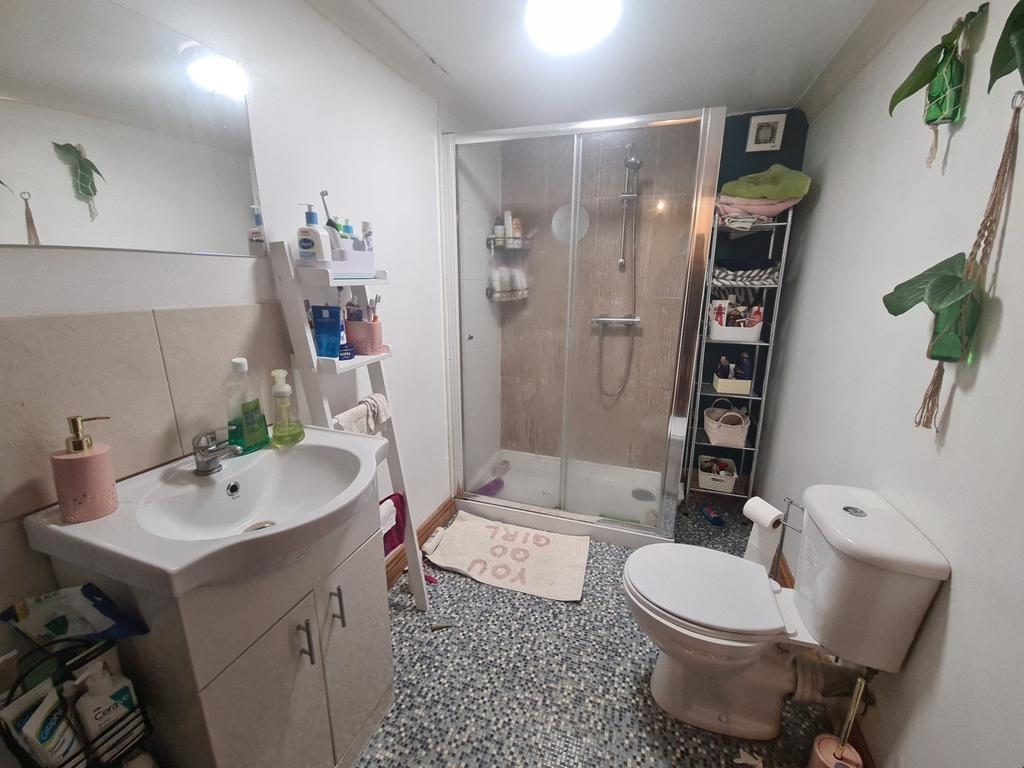 A clean and well-maintained bathroom with a spa...