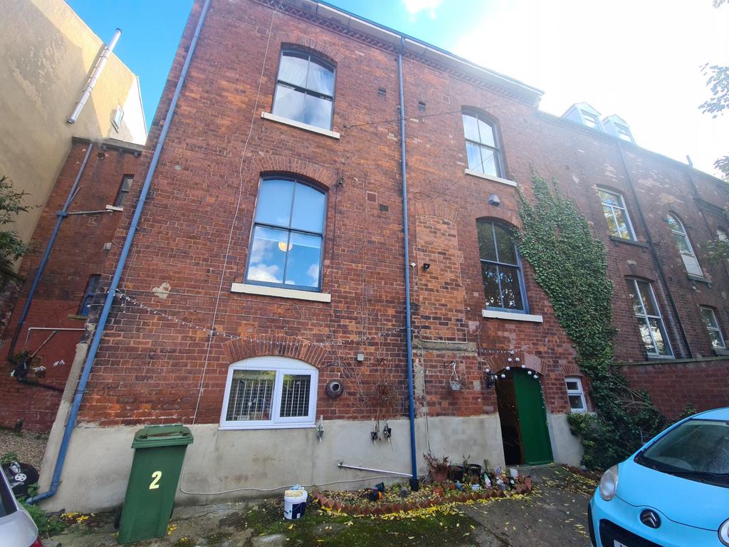 An exterior shot of a classic brick building wi...