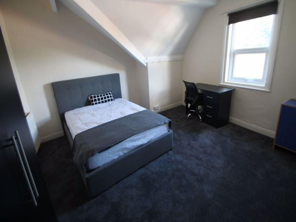 A well-maintained single bedroom featuring a co...