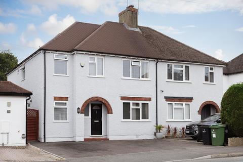 24 Read Road, Ashtead, KT21 2HS