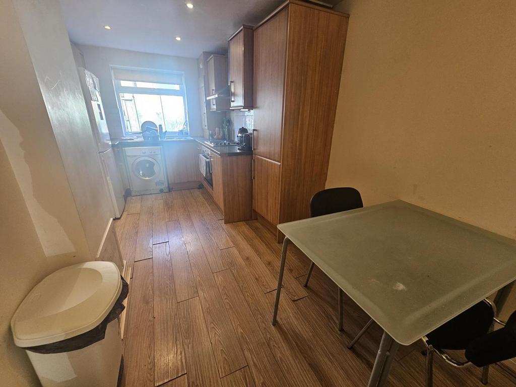 A bright and functional kitchen area featuring ...