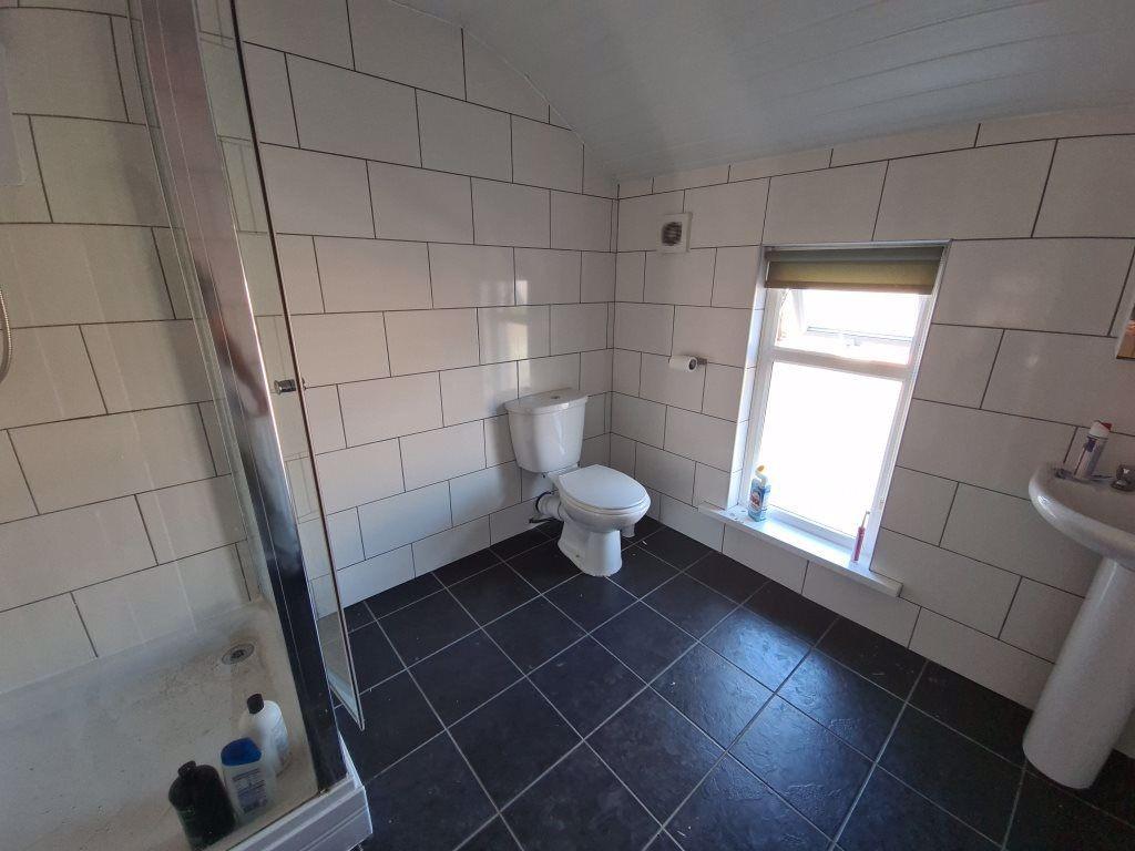 A bright and clean bathroom featuring a modern ...