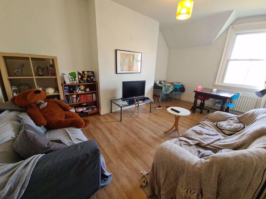 Bright and welcoming living room with comfortab...