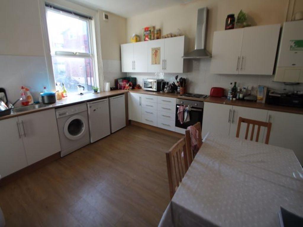 Bright and clean kitchen with ample natural lig...