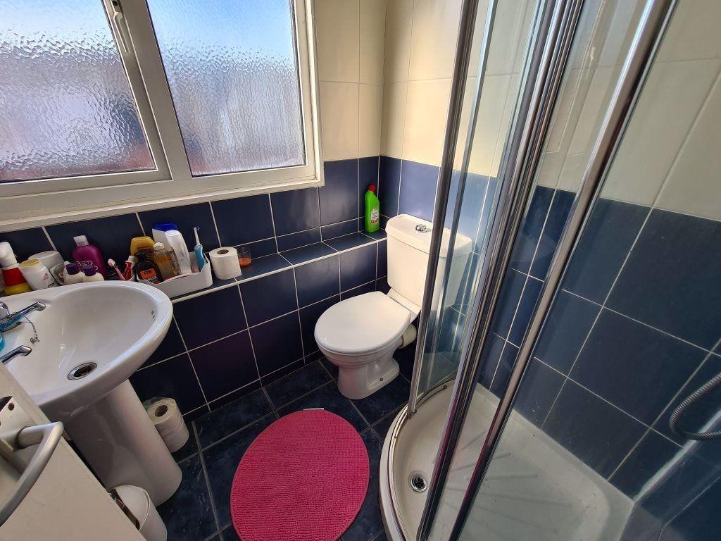 A well-maintained bathroom featuring a standard...
