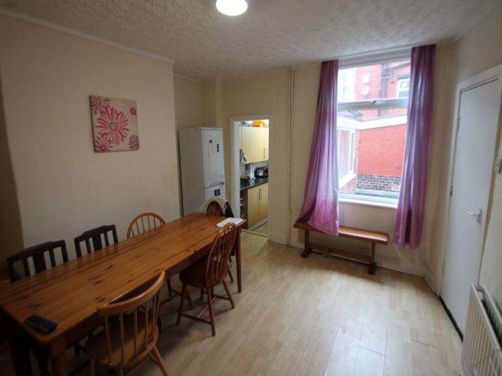 Bright and welcoming living room with a large w...