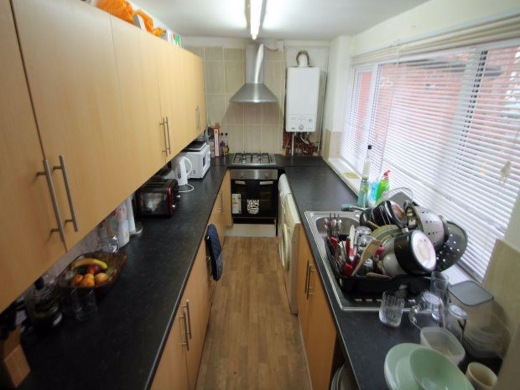 A bright and well-organized kitchen with modern...