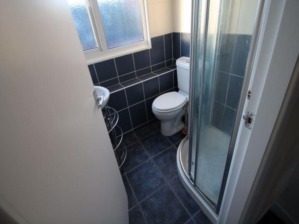 A clean and well-maintained bathroom featuring ...