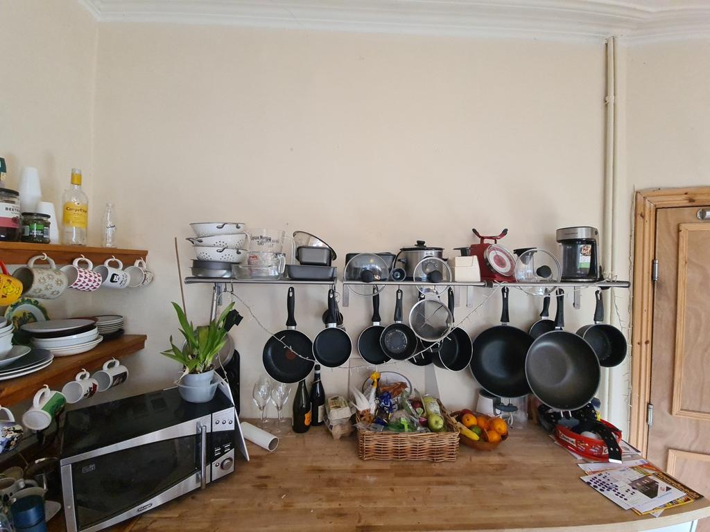 A well-organized kitchen area with a variety of...