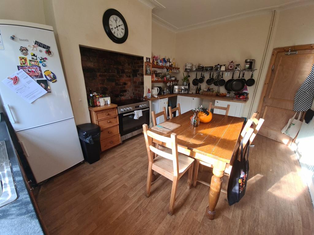 A bright and welcoming living room featuring a ...