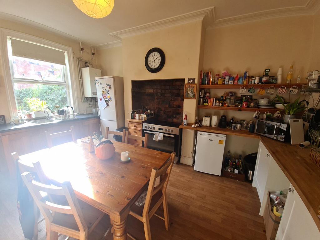 Bright and welcoming living room with ample nat...