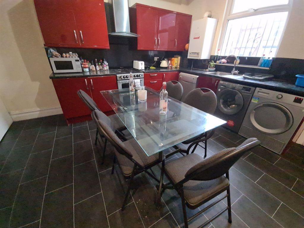 A well-organized kitchen with a modern feel, fe...