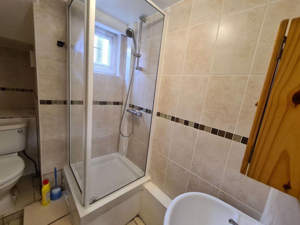 A clean and well-maintained bathroom featuring ...