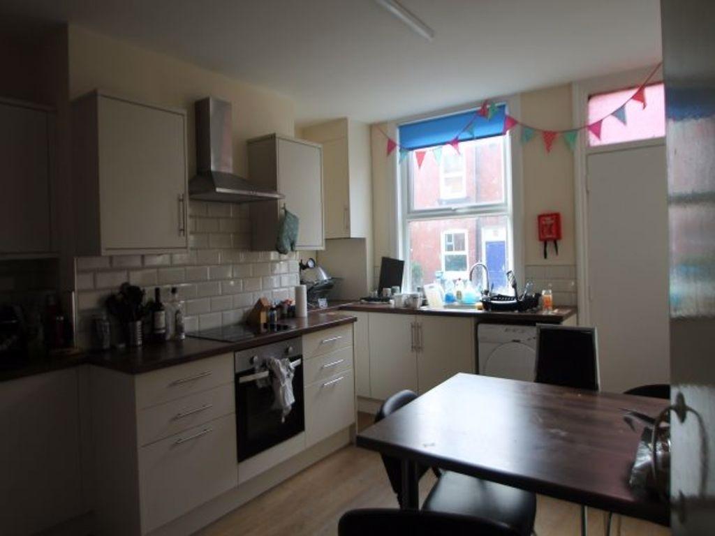 A cozy kitchen area with a window providing nat...