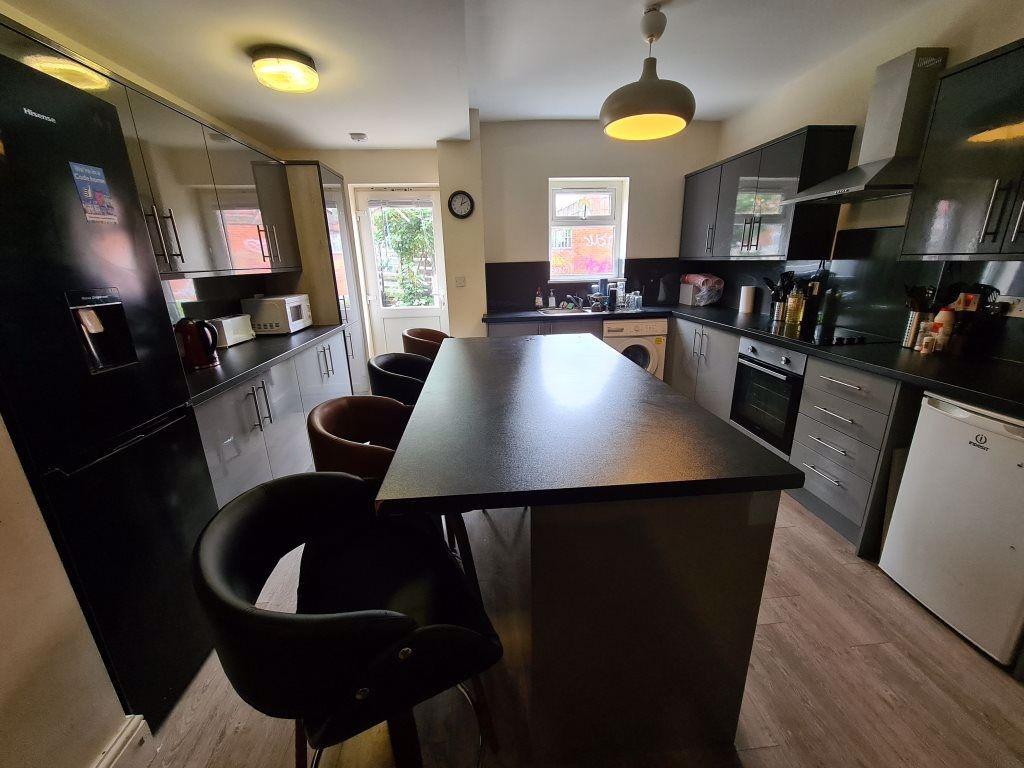 A modern kitchen with ample counter space, well...
