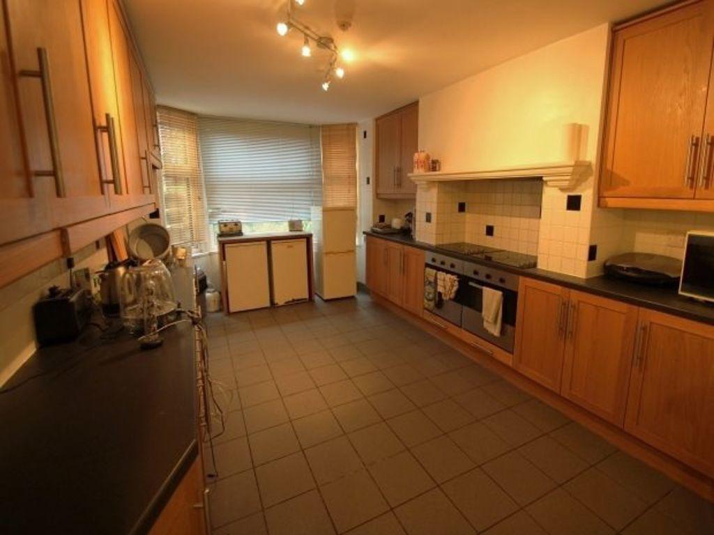 A well-maintained kitchen with ample counter sp...