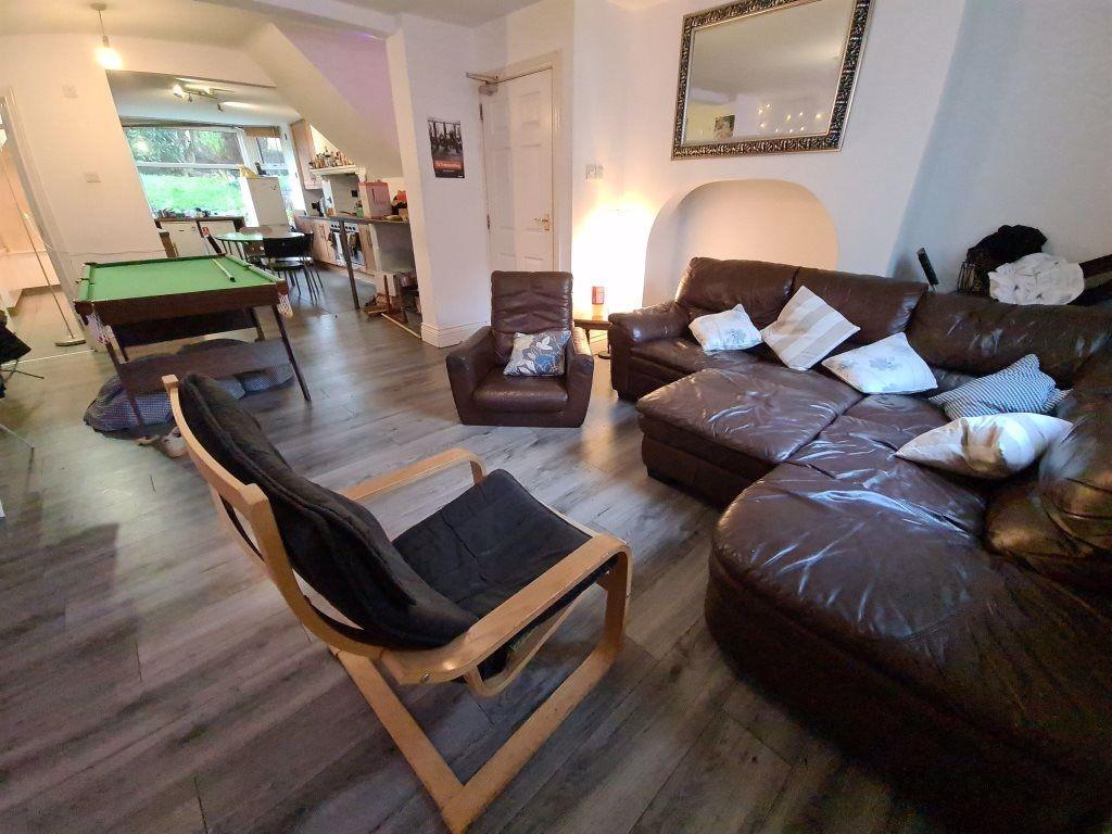 A spacious and inviting living room featuring c...