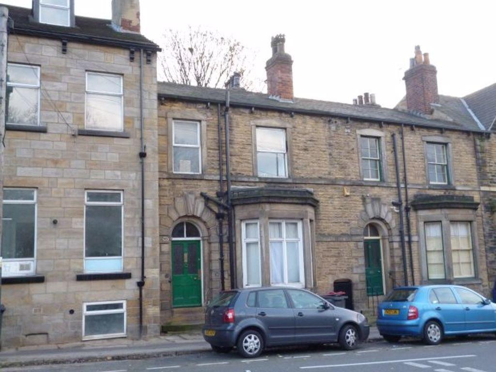 A charming traditional townhouse facade with a ...