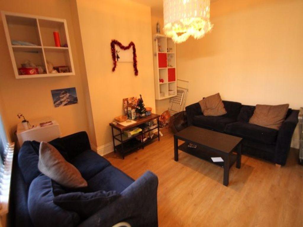 A cozy and inviting living room featuring comfo...