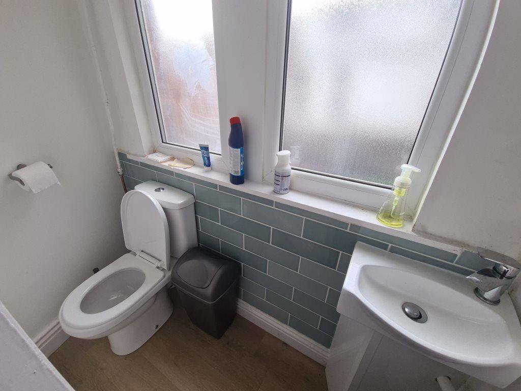 A clean and well-maintained bathroom with a mod...
