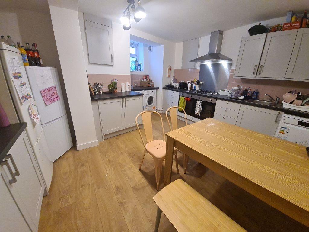 Bright and inviting kitchen area with plenty of...