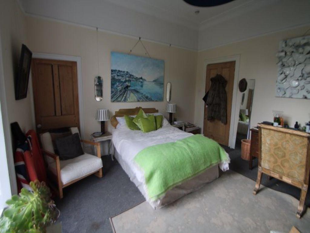 A spacious and well-presented master bedroom fe...