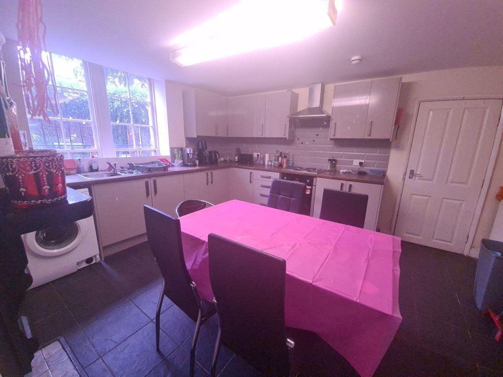 A bright, well-maintained kitchen featuring amp...