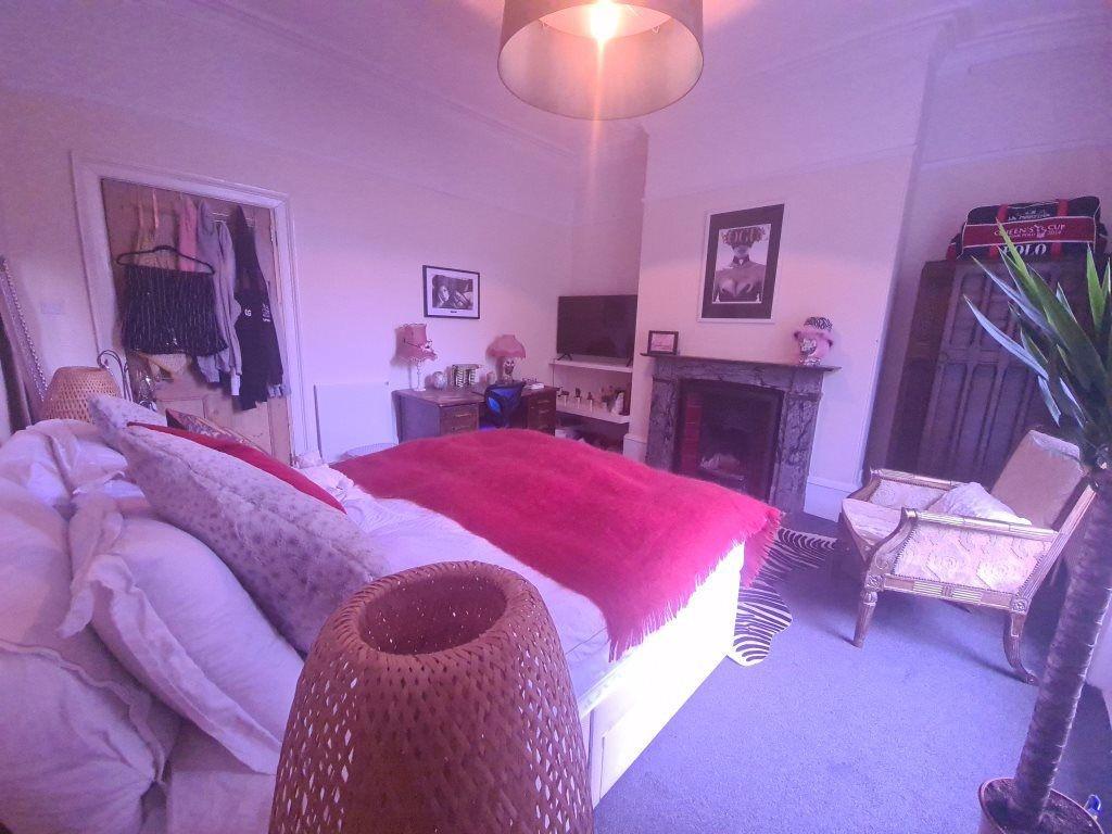 A spacious and inviting living room with ample ...