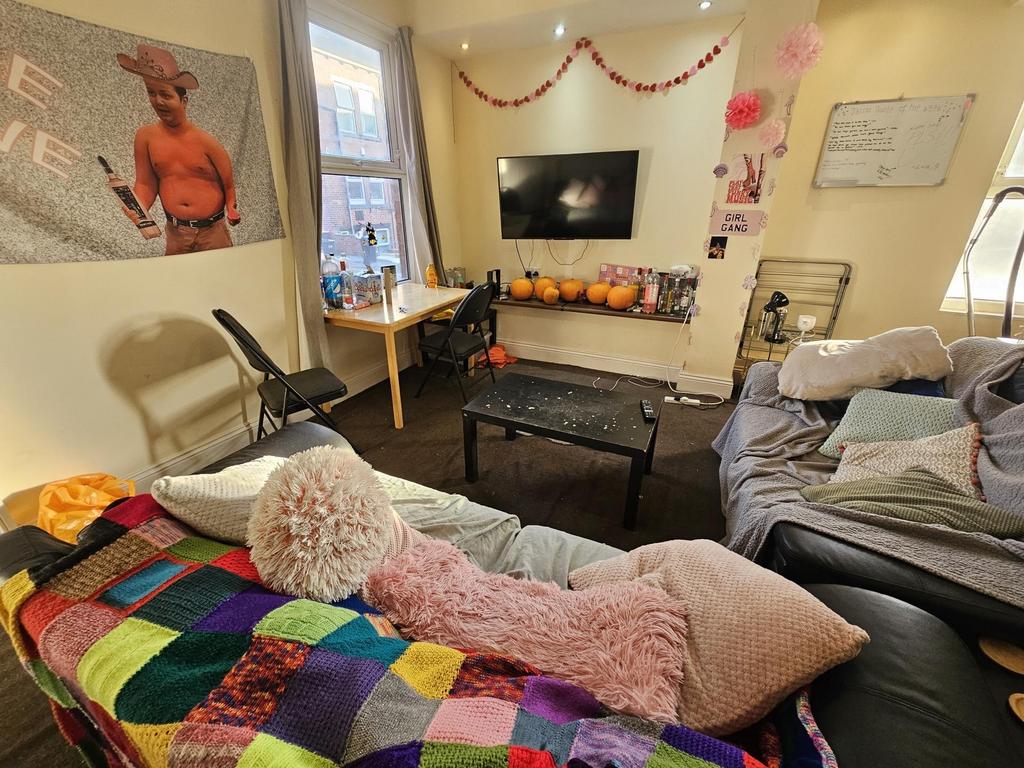 Bright, welcoming communal lounge with comfy so...