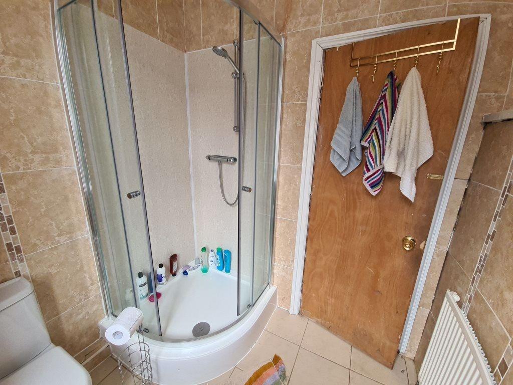 A clean and well-maintained bathroom featuring ...