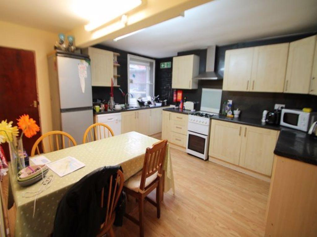 A bright and well-maintained kitchen featuring ...