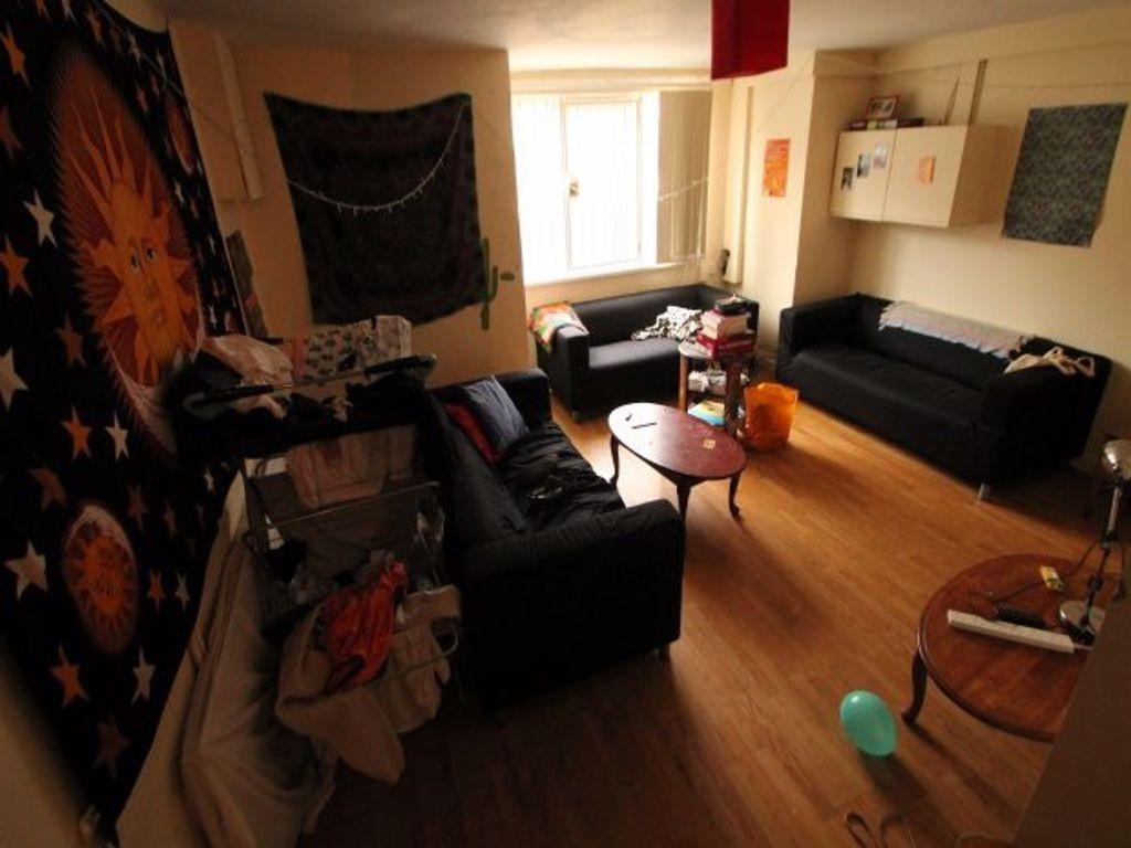 A cozy and inviting living room featuring multi...