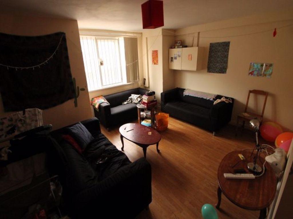 A cozy living room featuring comfortable seatin...
