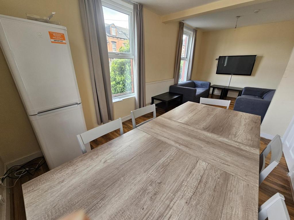 A bright and inviting living room featuring a l...