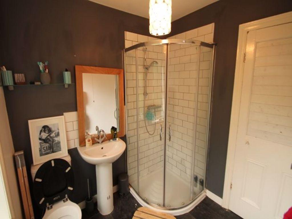 A clean and well-maintained bathroom featuring ...