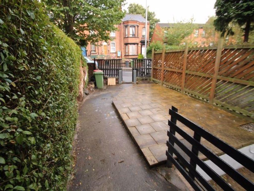 The image shows the front exterior of a residen...