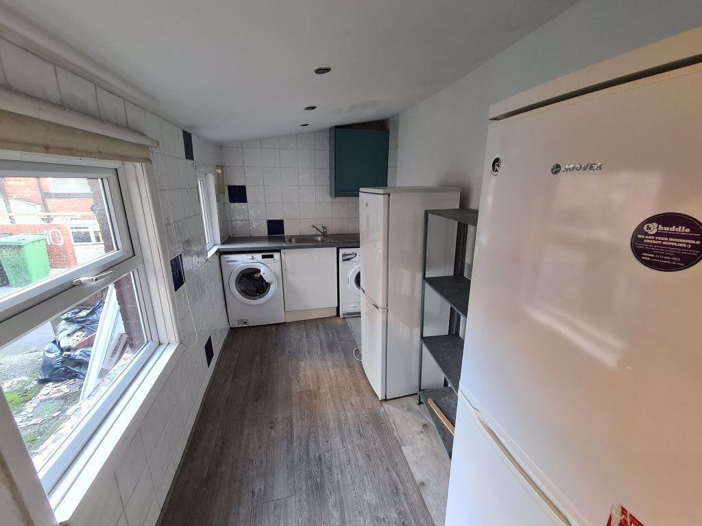 Bright and functional kitchen area featuring a ...