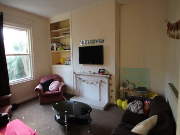 A modern and welcoming living room featuring co...