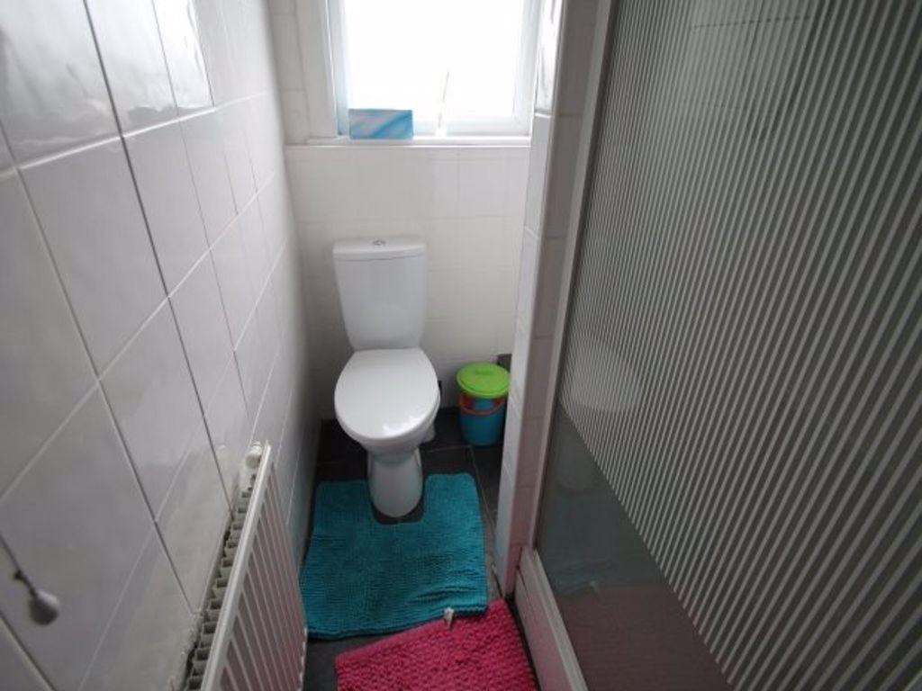 A clean and well-maintained bathroom featuring ...