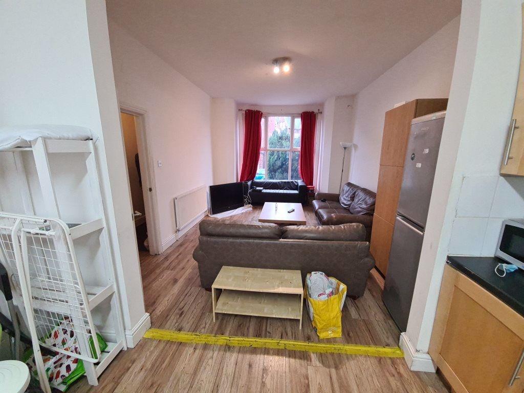A welcoming and well-maintained living room wit...