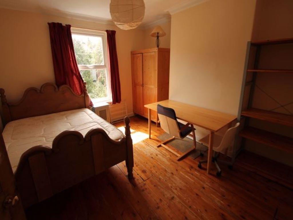 A cozy and well-maintained student bedroom feat...