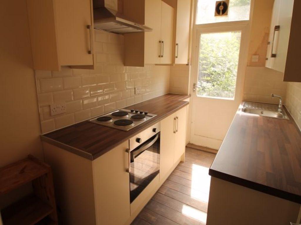 A bright, well-maintained kitchen area with goo...
