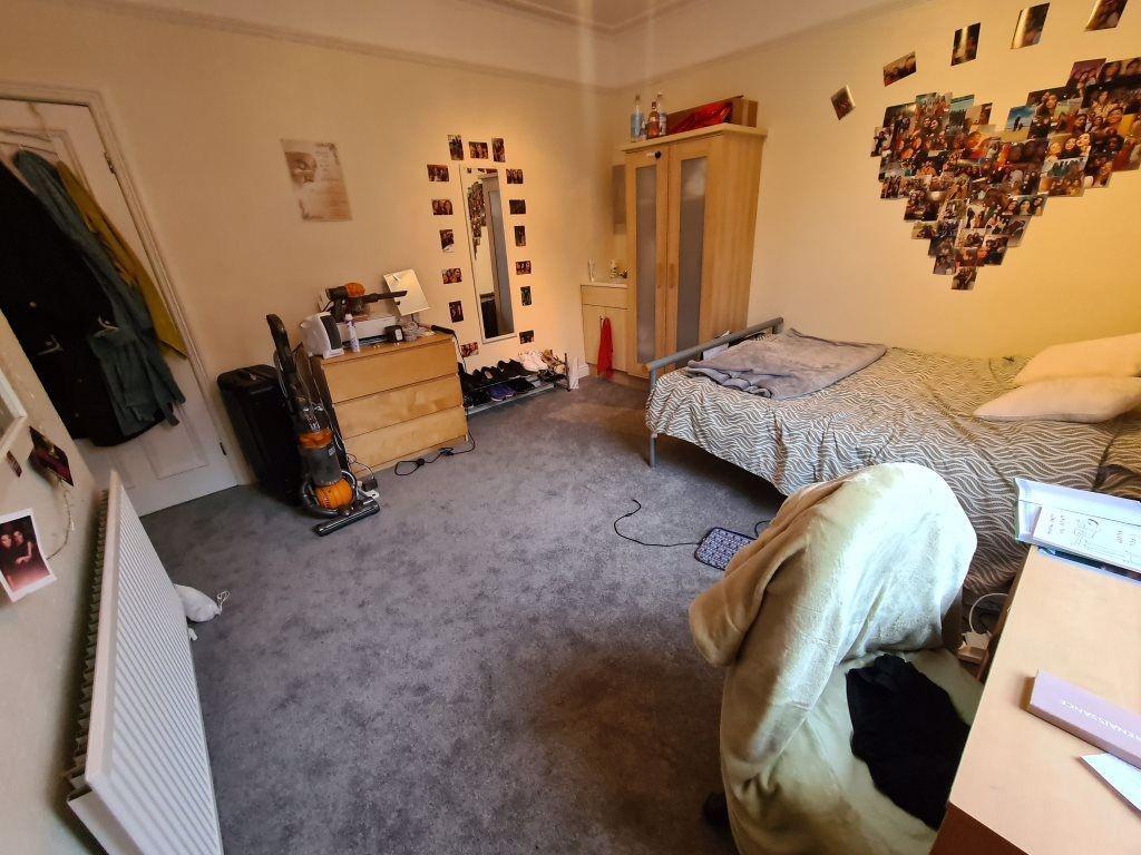 A cozy living room equipped with casual furnitu...