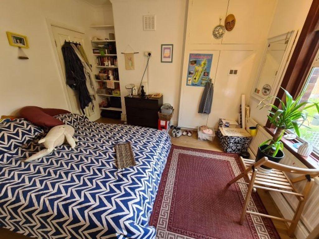 A bright, welcoming living room filled with nat...