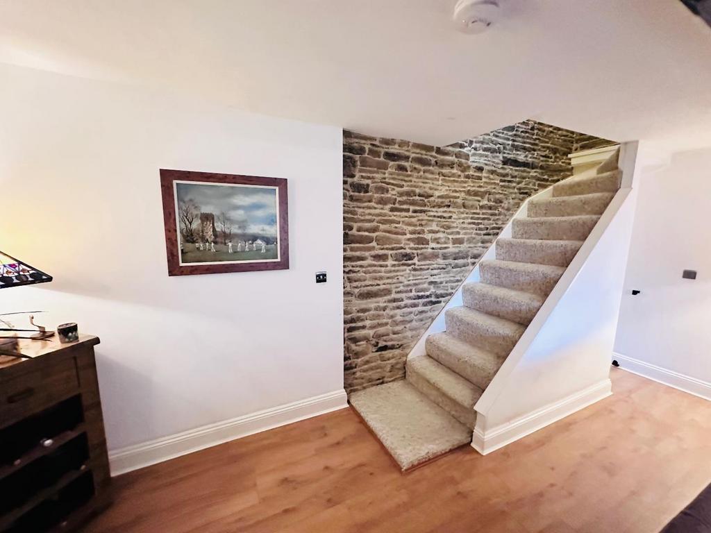 Open staircase to the first floor