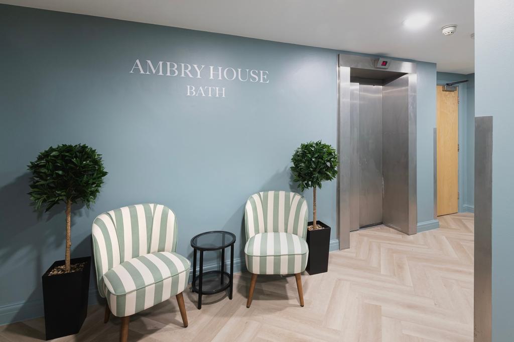 A welcoming reception area featuring stylish se...