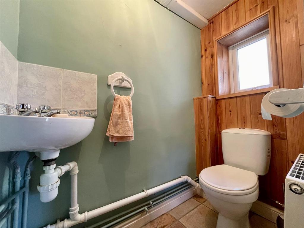 E. CLOAKROOM website.jpg
