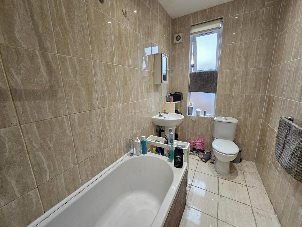 A clean and well-maintained bathroom featuring ...