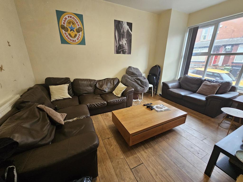 A spacious and inviting living room featuring l...
