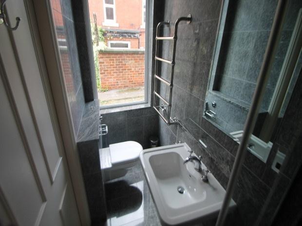 A modern and well-maintained bathroom featuring...
